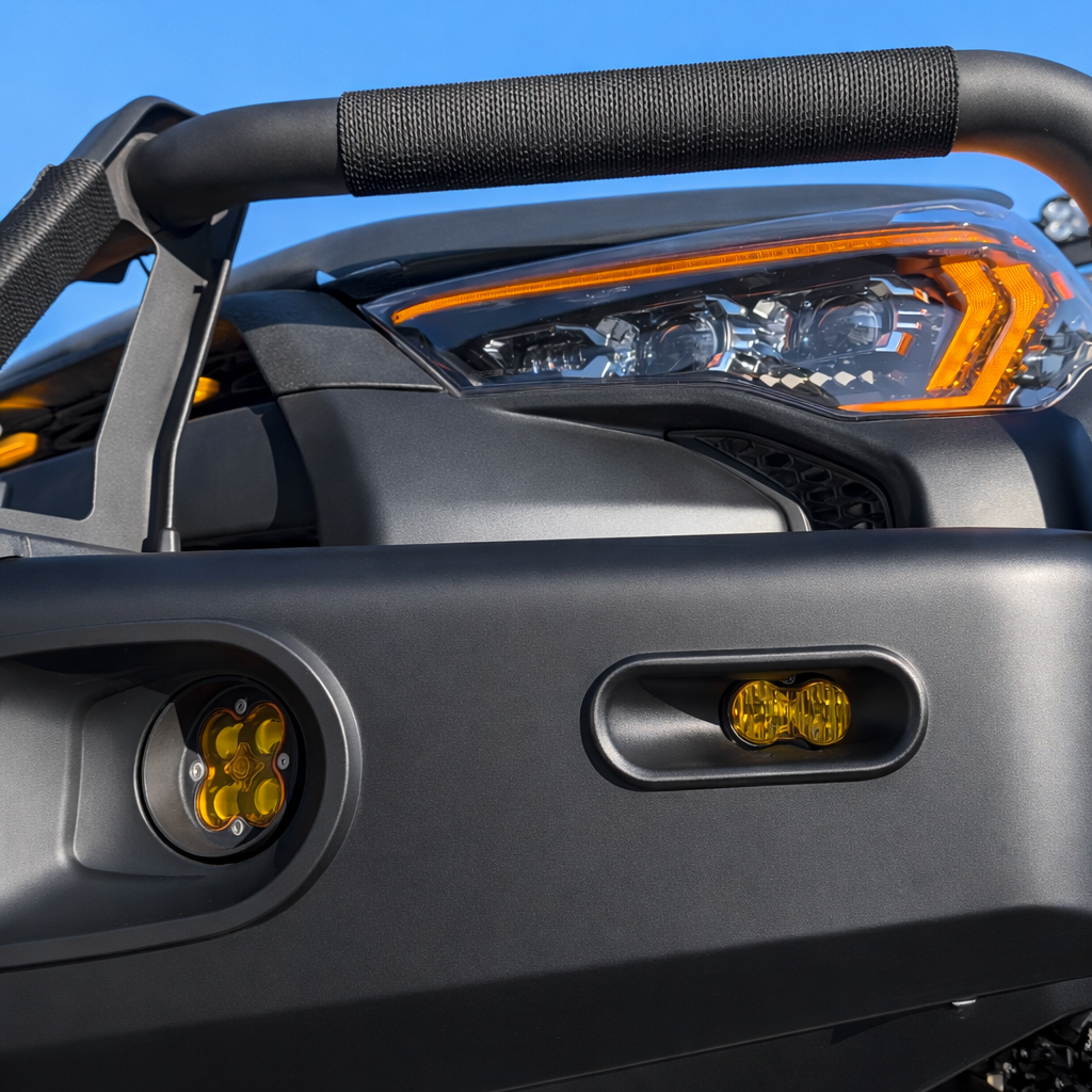 Close-up of a toyota 4runner ARB front bumper with baja s2 fog lights against a blue sky. replaces ARB part number 6821287